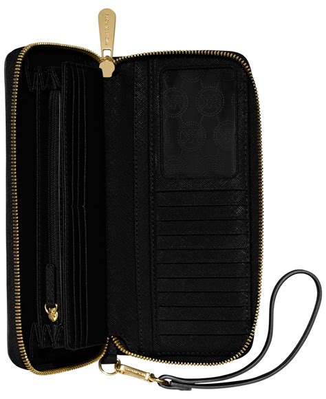 michael kors jet set monogram continental wallet black|Michael Kors continental wristlet.